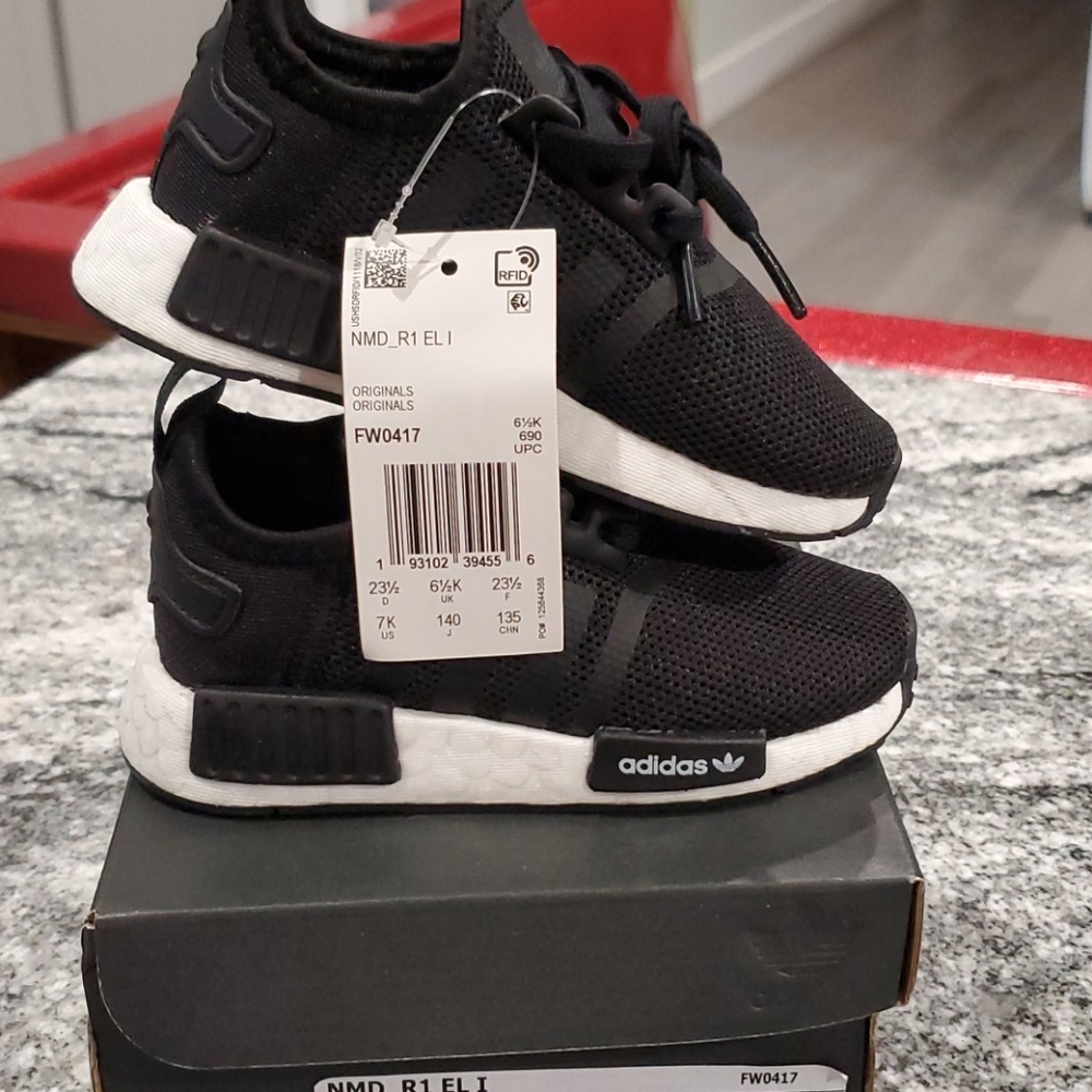 Never worn toddler Adidas tennis shoes